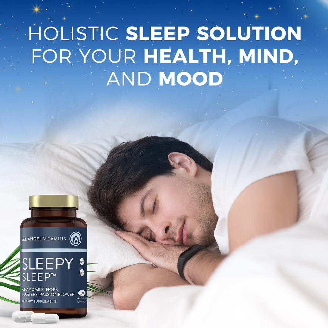 A blue bottle of Mt. Angel Vitamins Sleepy Sleep is shown in front of a man sleeping peacefully in his bed. The tagline reads Holistic Sleep Solution for your Health, Mind and Mood
